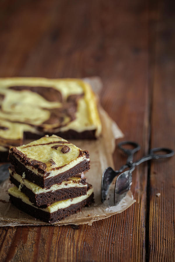 Cheesecake Brownies On Baking Paper Photograph by M. Nlke