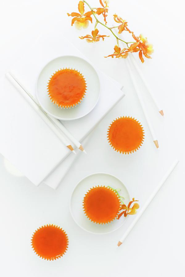Cheesecake Cupcake With Apricot Glaze Photograph by Sam Henderson Imagery