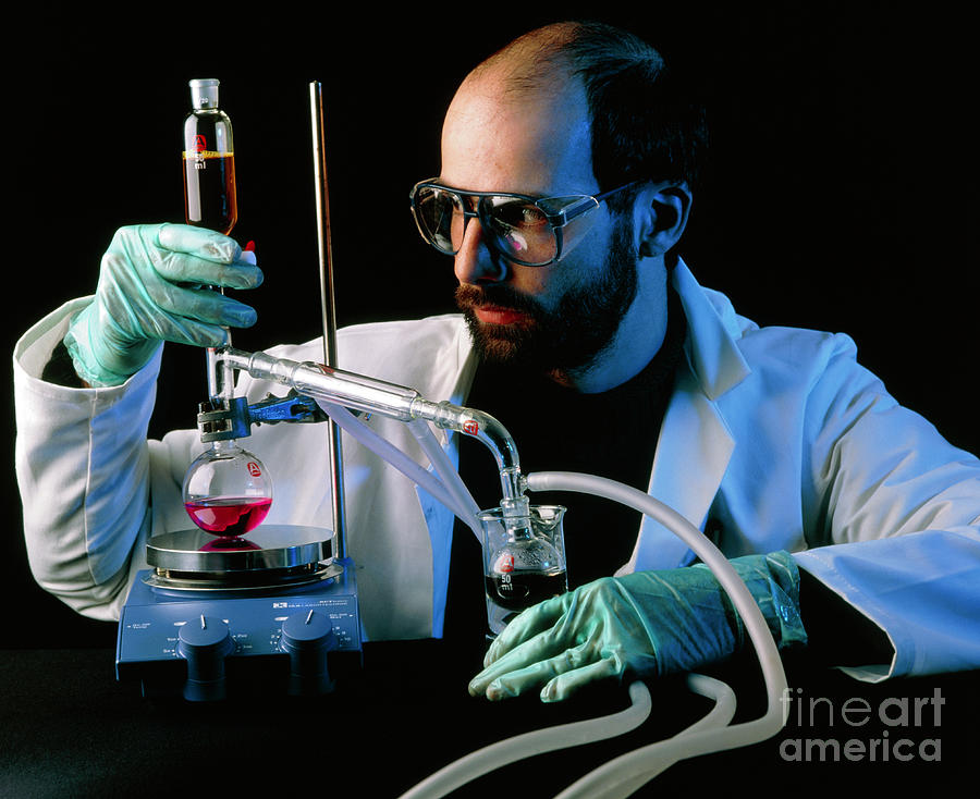 Chemist With Distillation Apparatus Photograph by Michael Donne/science Photo Library