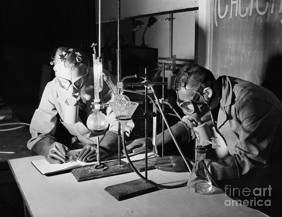 Chemists Wear Gas Masks While Purifying Photograph by Bettmann