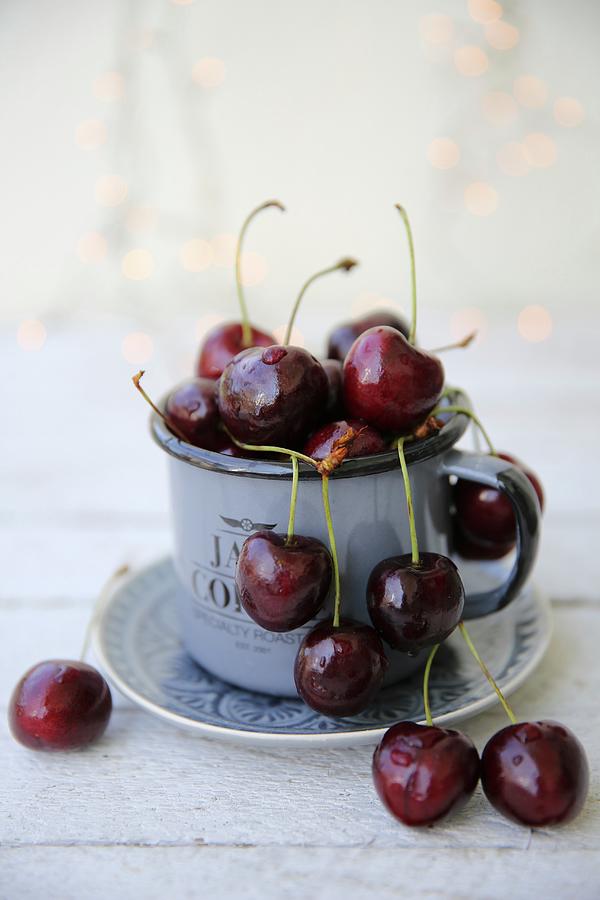 Cherries In An Enamel Mug Photograph by Dorota Ryniewicz