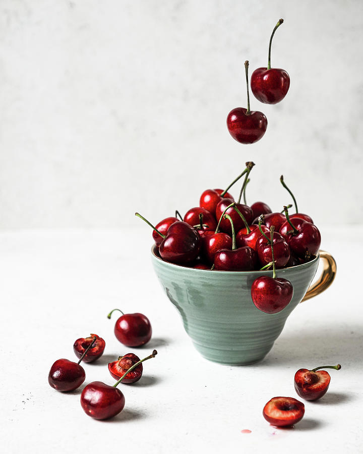 Cherries In The Cup Photograph by Bozena Garbinska