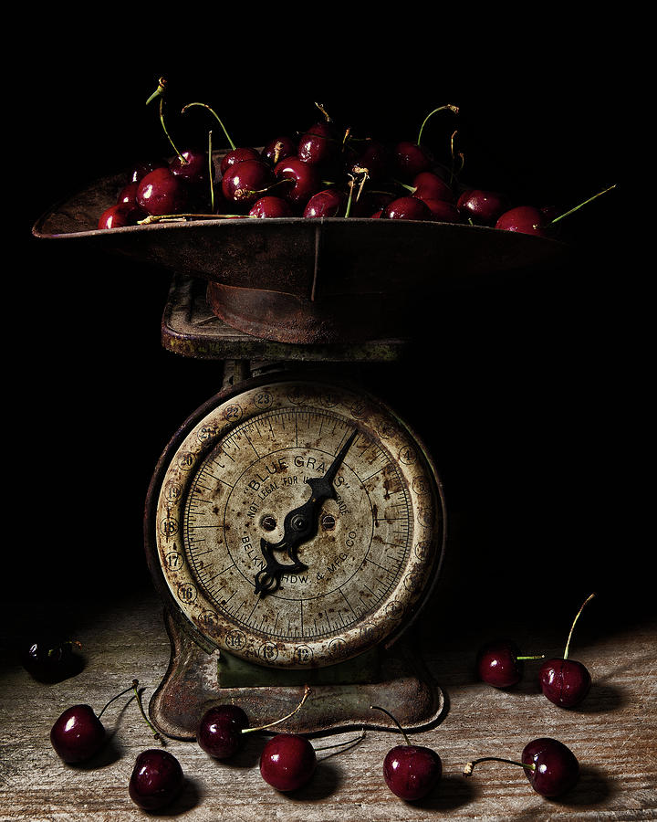 Cherries on Scale Photograph by Richard Rizzo