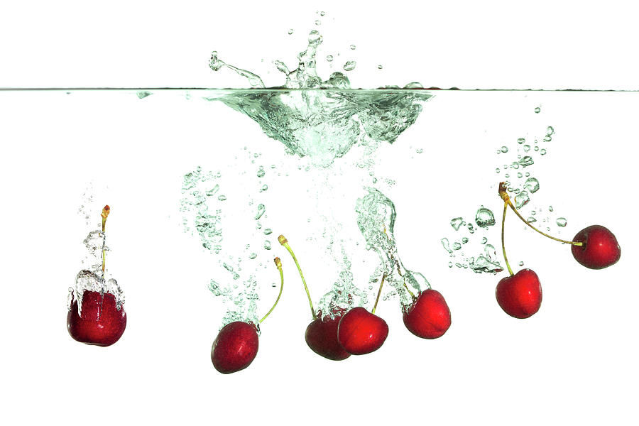 Cherries Splash Photograph by Asbe