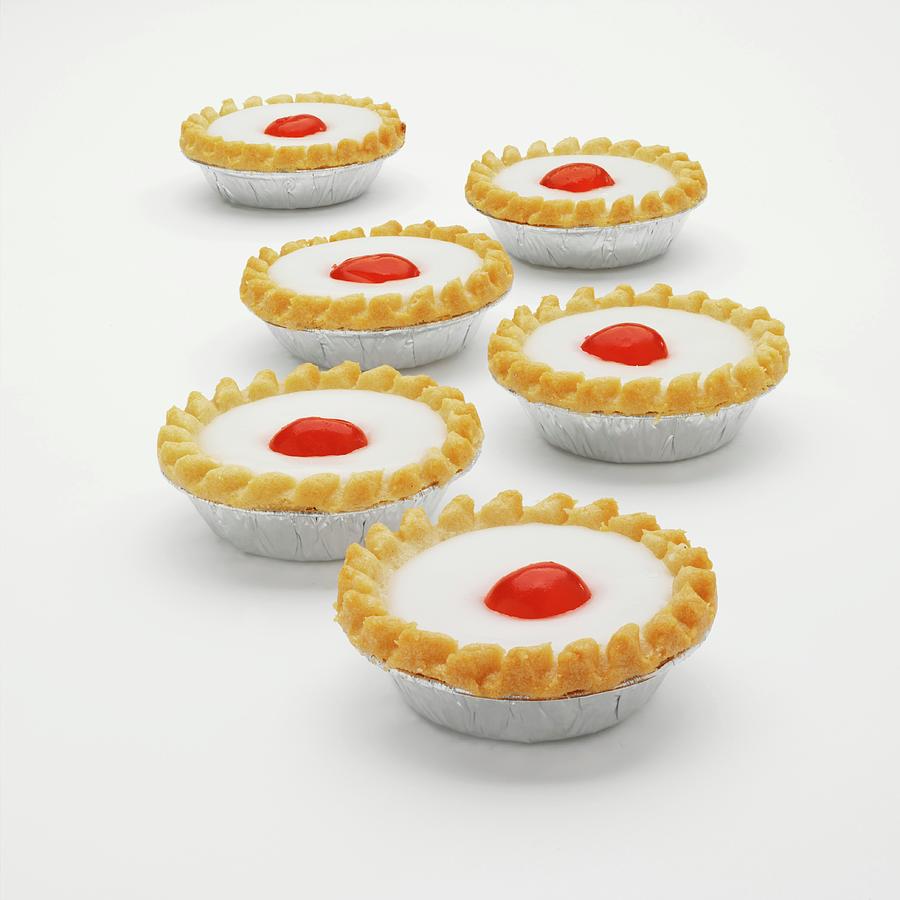 Cherry Bakewell Tarts In Foil Cases Photograph by Robert Morris