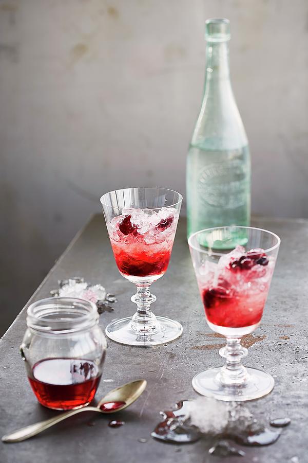 Cherry Brandy With Ice Photograph by Rafael Pranschke