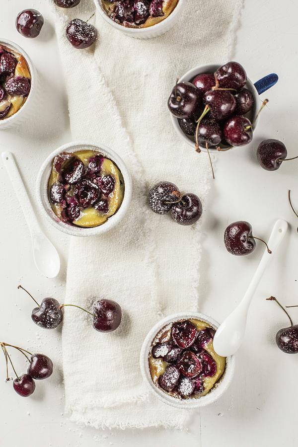 Cherry Clafouti With Icing Sugar Photograph by Julia Cawley