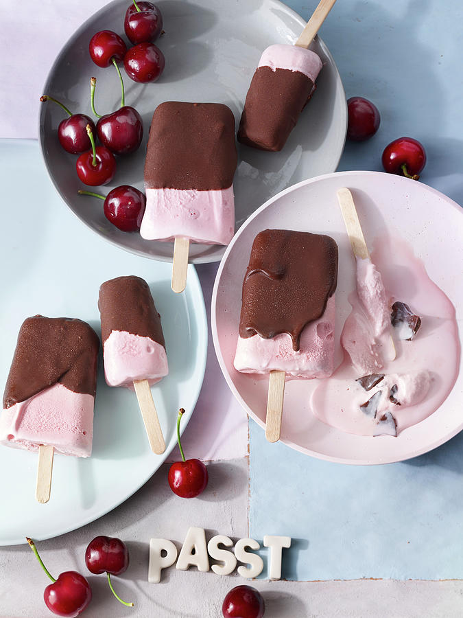 Cherry Ice Cream Pops With Chocolate Glaze Photograph by Nikolai Buroh