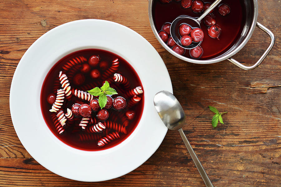 Cherry Soup With Noodles In A Bowl And A Saucepan Photograph by Mariola Streim