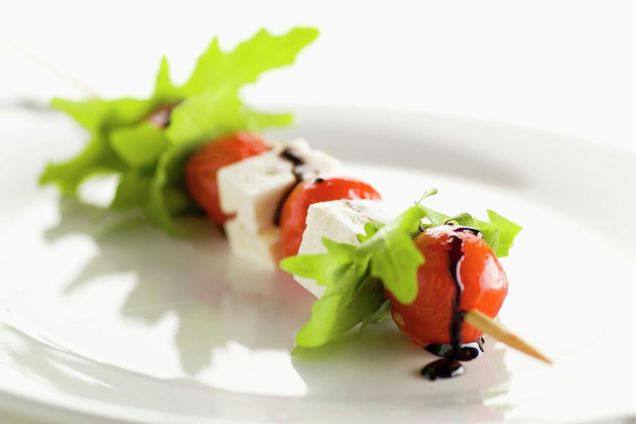 Cherry Tomato, Rocket Lettuce And Feta Brochette Photograph by Gelberger