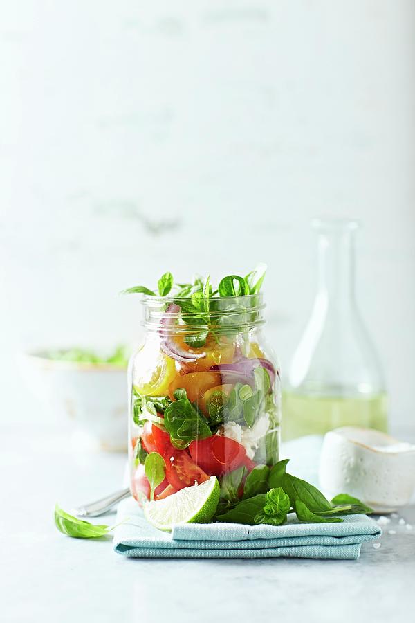 Cherry Tomato Salad With Corn Salad And Mozzarella In A Jar Photograph by B.&.e.dudzinski
