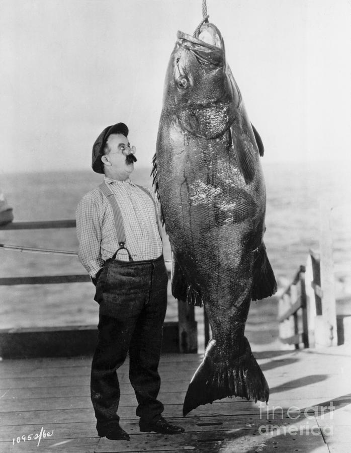 Chester Conklin Stands By Giant Fish Photograph by Bettmann