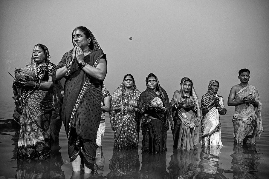 Black And White Photograph - Chhat Puja by Sanghamitra Bhattacharya