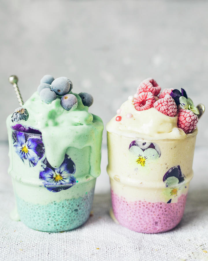 Chia Seed And Coconut Milk Dessert And Blueberry,raspberry And Flower Iced Smoothie Photograph by Velsberg