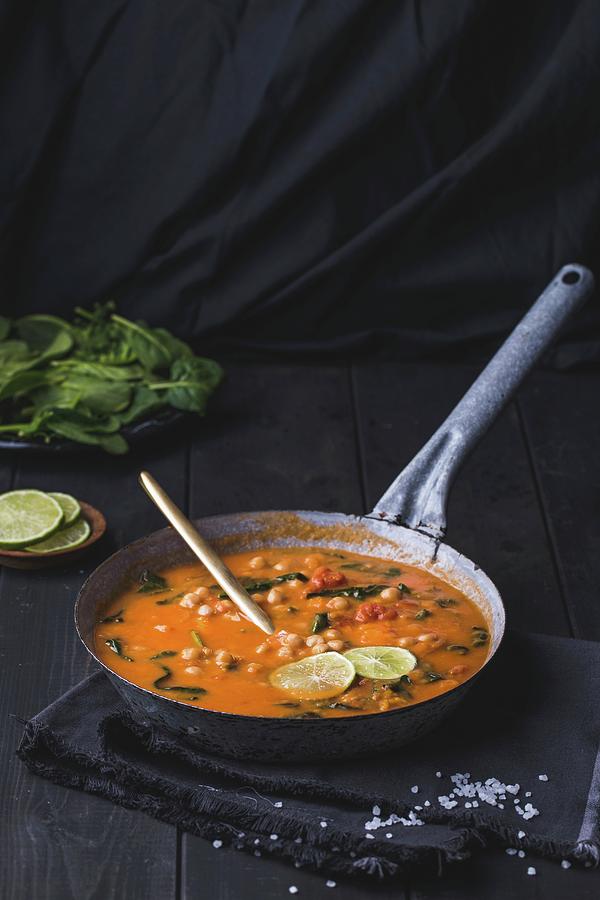 Chick Pea And Sweet Potato Curry With Spinach Photograph by Karolina Kosowicz
