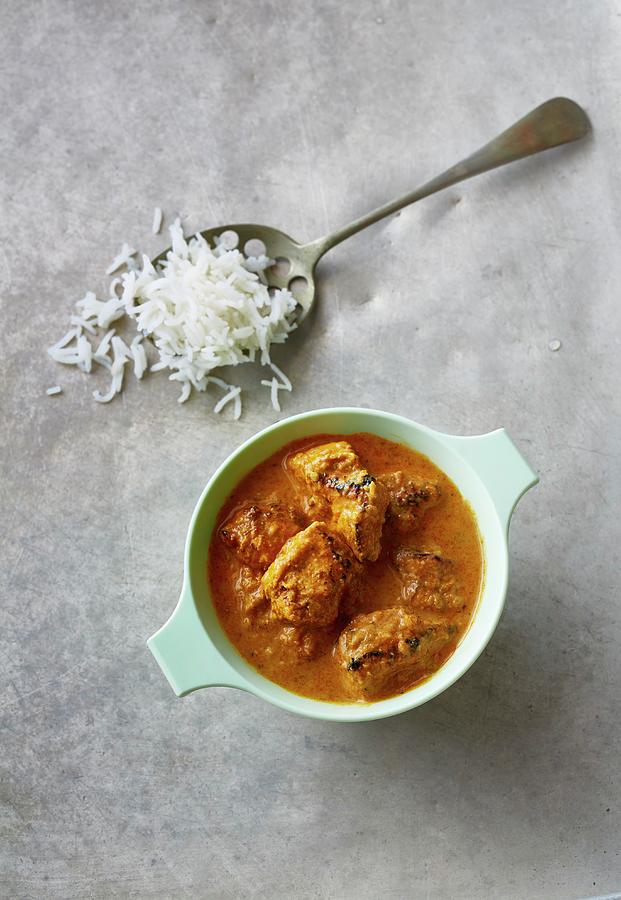 Chicken And Coconut Curry With A Spoonful Of Rice Photograph by Clive Streeter