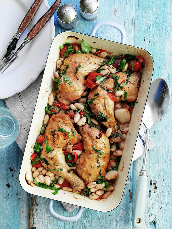 Chicken Baked With Tomatoes And White Beans Photograph by Gareth Morgans