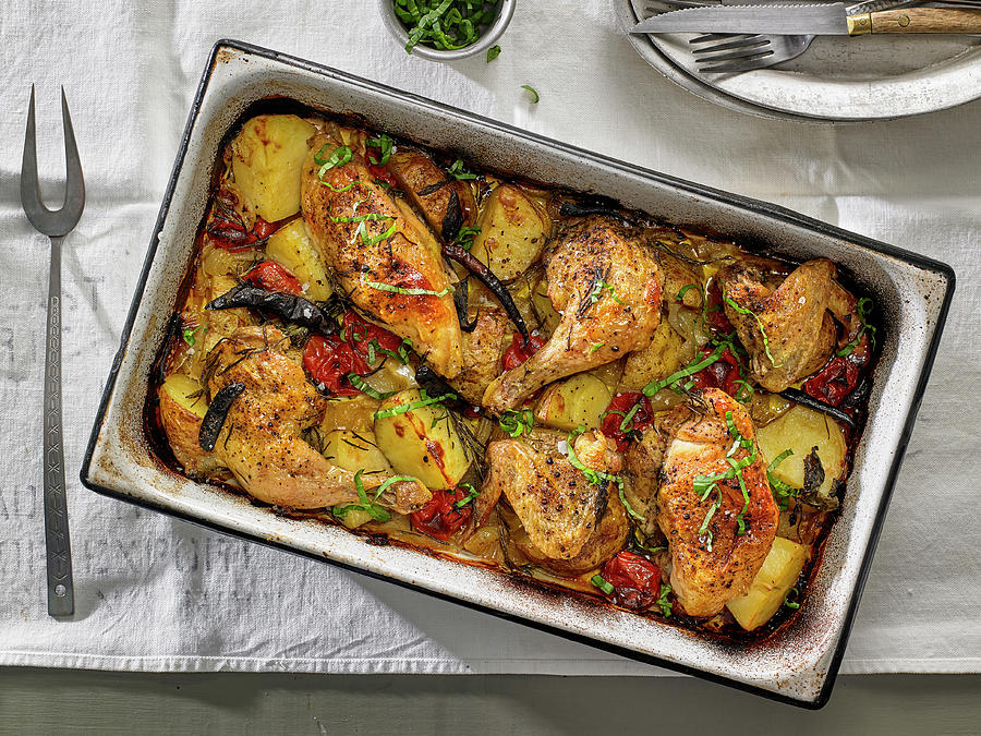 Chicken Baked With Yukon Gold Potatoes, Cherry Tomatoes And Herbs Photograph by Michael Kraus