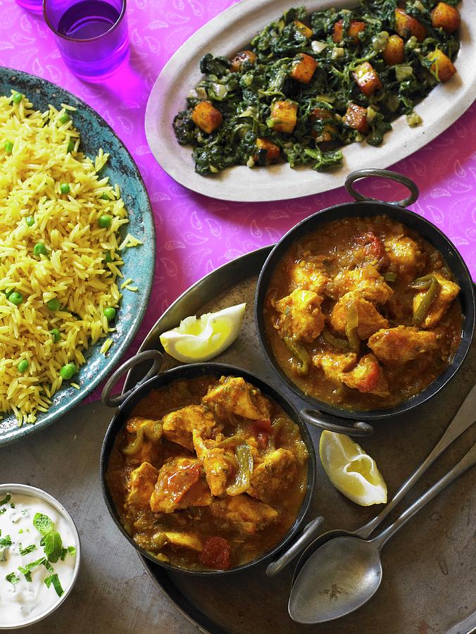 Chicken Balti chicken Curry, India With Spinach And Saffron Rice Photograph by Clive Streeter