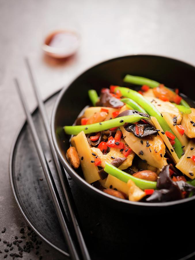 Chicken, Bamboo Shoots, Black Mushrooms, Green Bean, Almond And Black Sesame Seed Wok Photograph by Bonnier