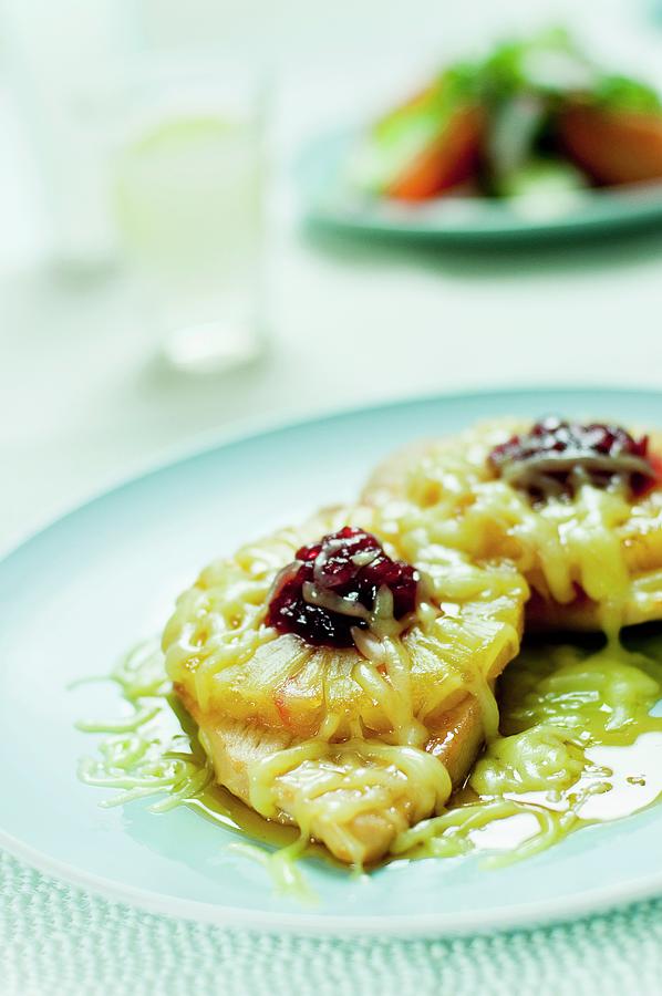 Chicken Breast Fillets With Pineapple, Lingonberries And Cheese Photograph by Tomasz Jakusz