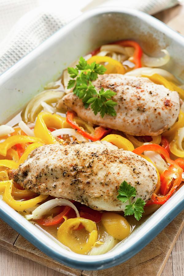 Chicken Breast On A Pepper Medley In A Baking Dish Photograph by Jonathan Short