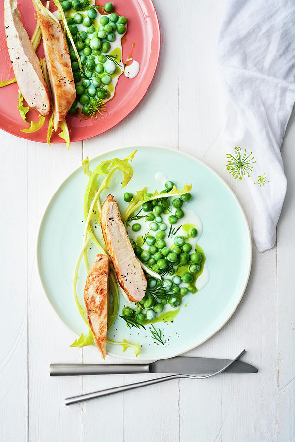 Chicken Breast With Peas In A Buttermilk And Dill Dressing Photograph by Stockfood Studios / Andrea Thode Photography