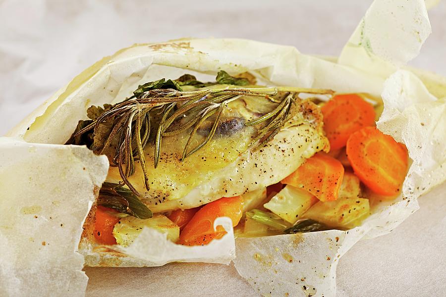 Chicken Breast With Summer Vegetables And Porcini Mushrooms Wrapped In Paper Photograph by Herbert Lehmann