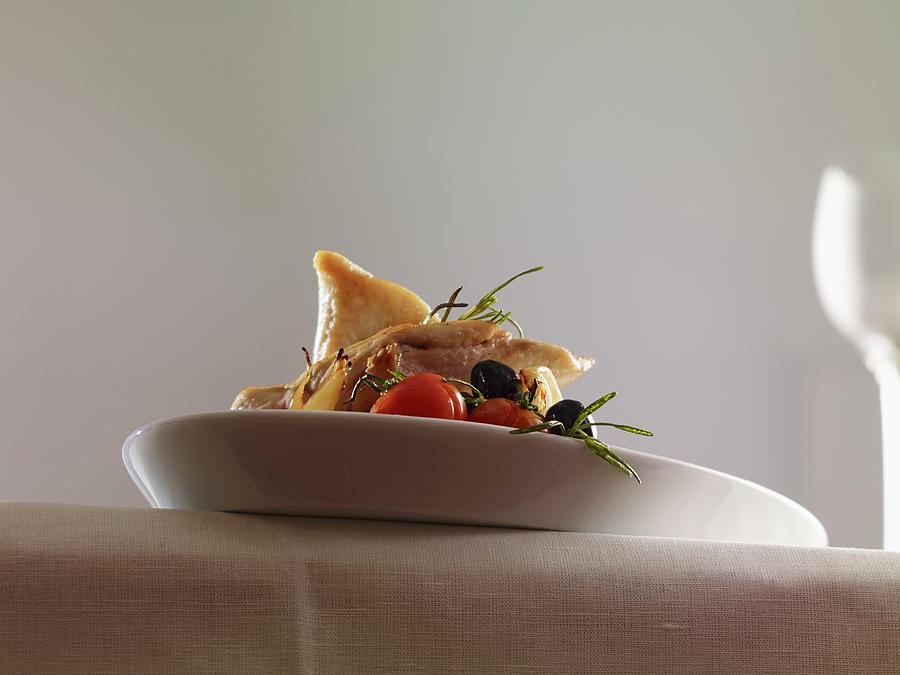 Chicken Breast With Tomatoes, Olives, Onions And Rosemary Photograph by Studio R. Schmitz