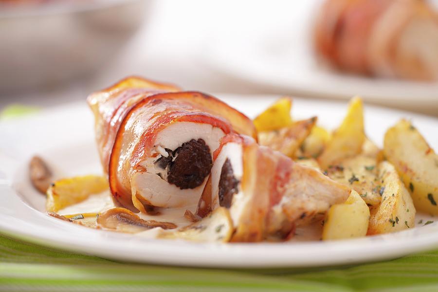 Chicken Breast Wrapped In Bacon Filled With Plums Photograph by Studio Lipov