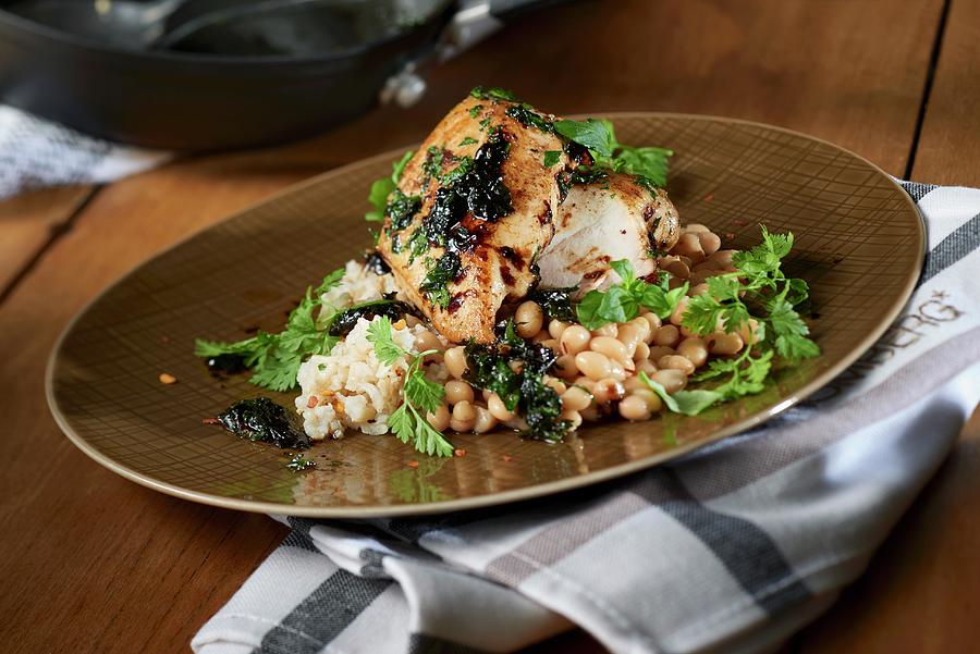 Chicken Breasts On Rice And White Beans Photograph by Studio R. Schmitz