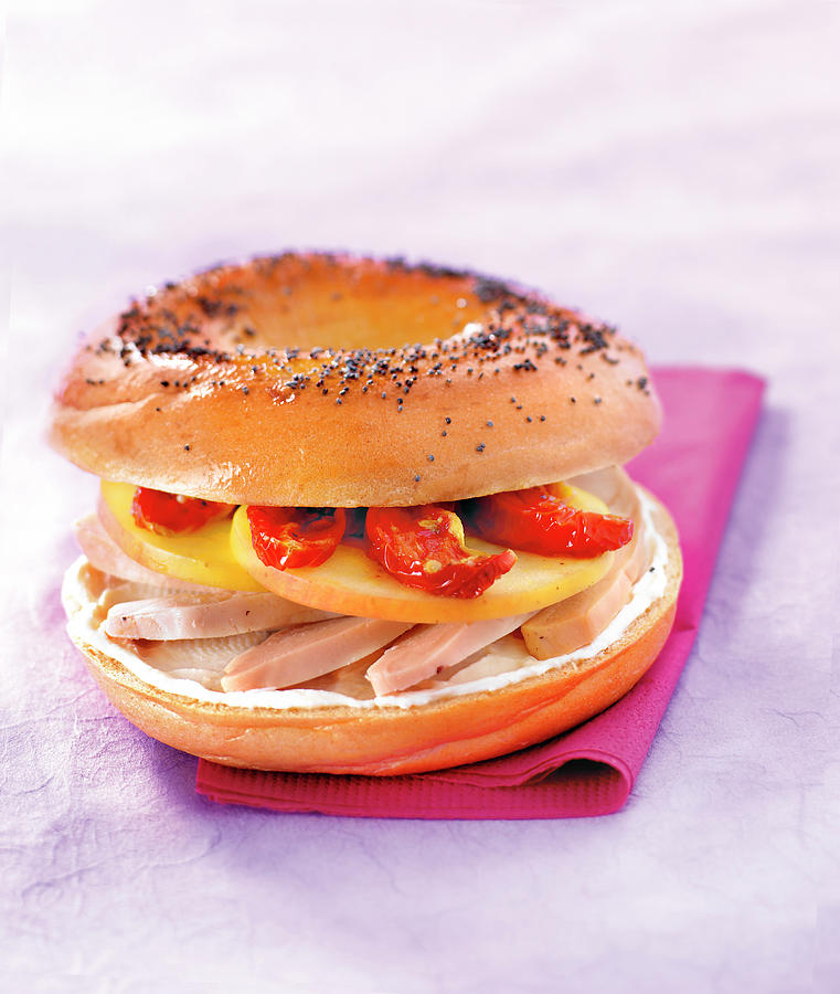 Chicken, Cream Cheese, Apple And Sun-dried Tomato Bagel Sandwich Photograph by Nicolas Edwige