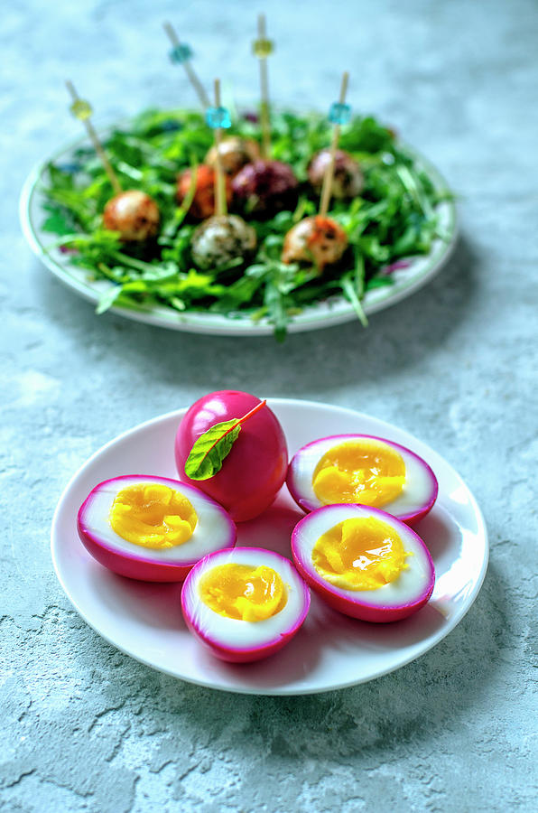 Chicken Eggs, Painted Beet Juice, Quail Eggs In A Variety Of Spices And Arugula Photograph by Gorobina
