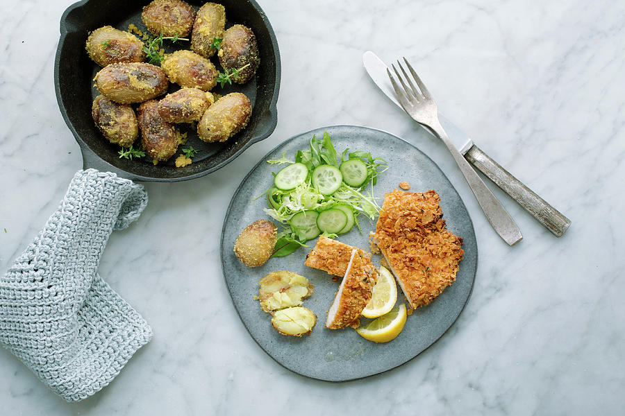 Chicken Escalope With A Cornflake Coating, Polenta Potatoes And Salad Photograph by Tina Engel