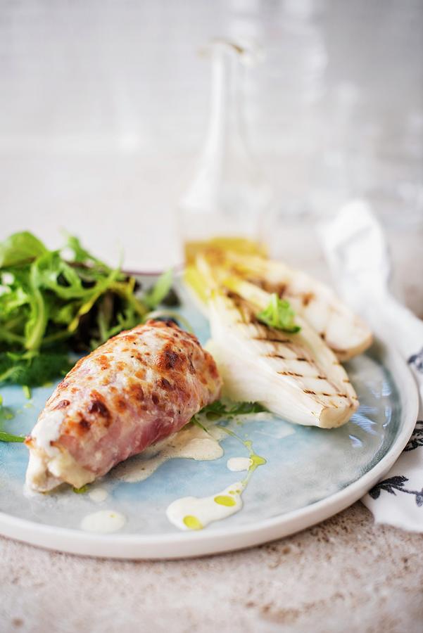 Chicken Fillet Grilled With Bacon And Grilled Chicory Photograph by Thys