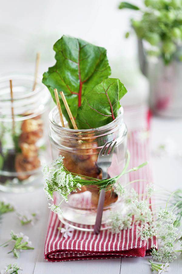 Chicken Skewer With Chard, In A Jar With Cow Parsley Tied Round It Photograph by Schindler, Martina