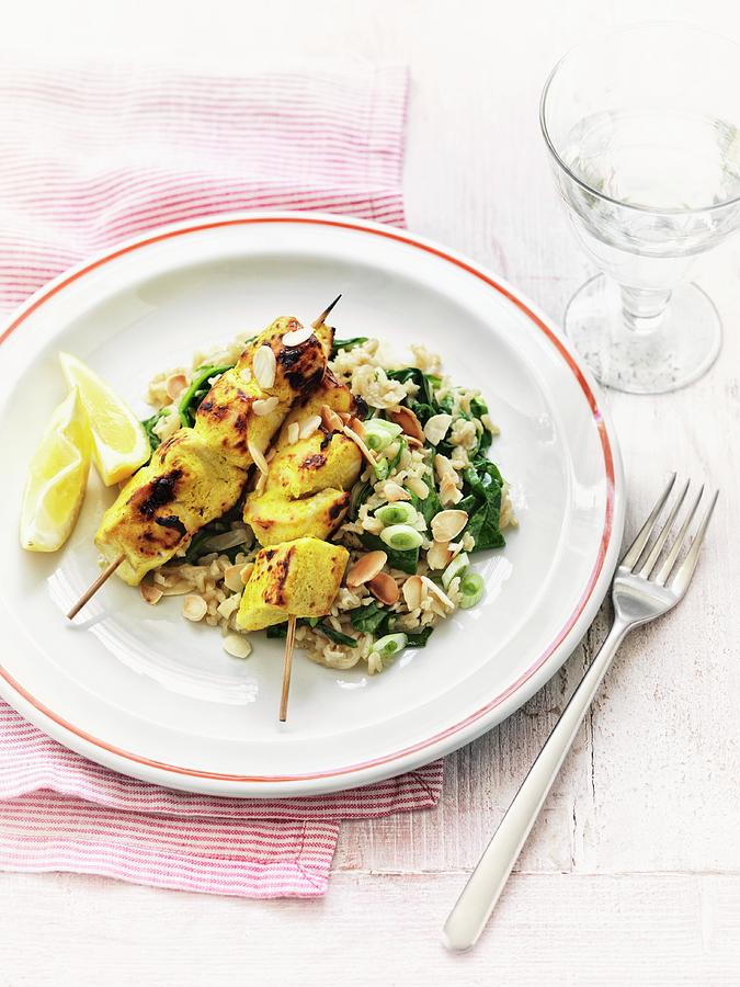 Chicken Skewers With Almond And Spinach Rice Photograph by Jonathan Gregson