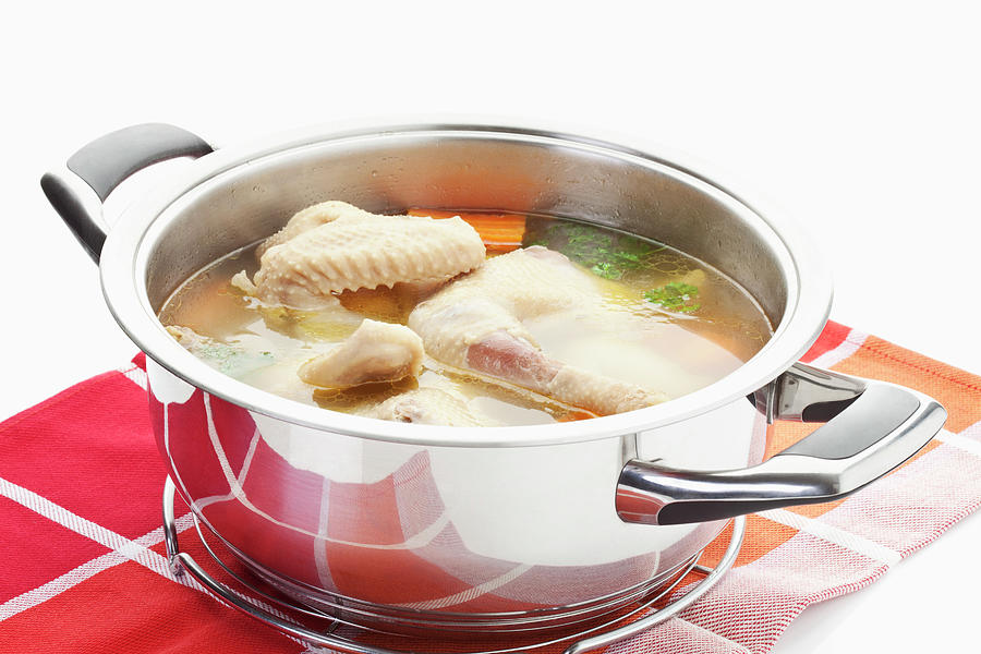 Chicken Soup In Stew Pot On Napkin Photograph by Westend61