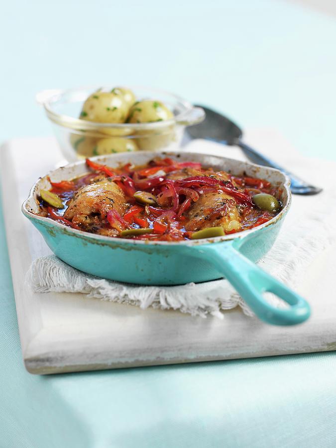 Chicken Stew With Peppers And Olives, With Parsley Potatoes On The Side Photograph by Ian Garlick