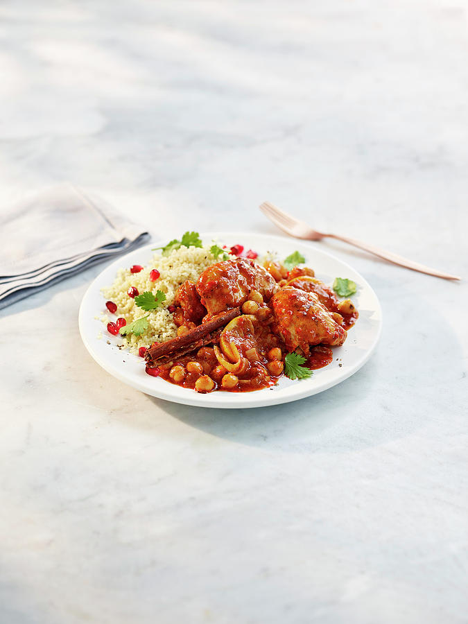 Chicken Tagine With Chickpeas And Couscous Photograph by Gareth Morgans