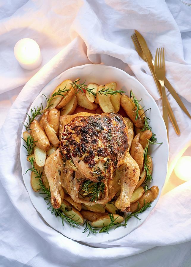 Chicken With Feta, Herbs, A Cranberry Filling And Potatoes Photograph by Great Stock!