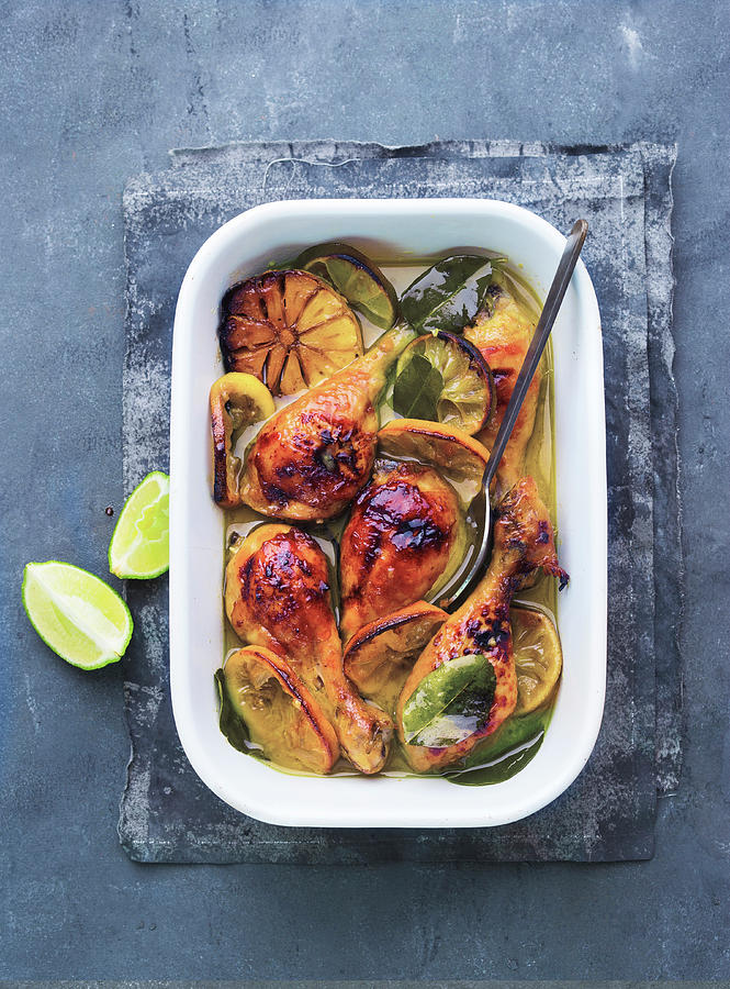 Chicken With Lemon And Lime In A Sweet-and-sour Garlic And Curry Marinade Photograph by Ira Leoni