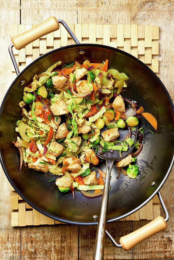 Chicken With Vegetables In A Wok Photograph by Jonathan Short