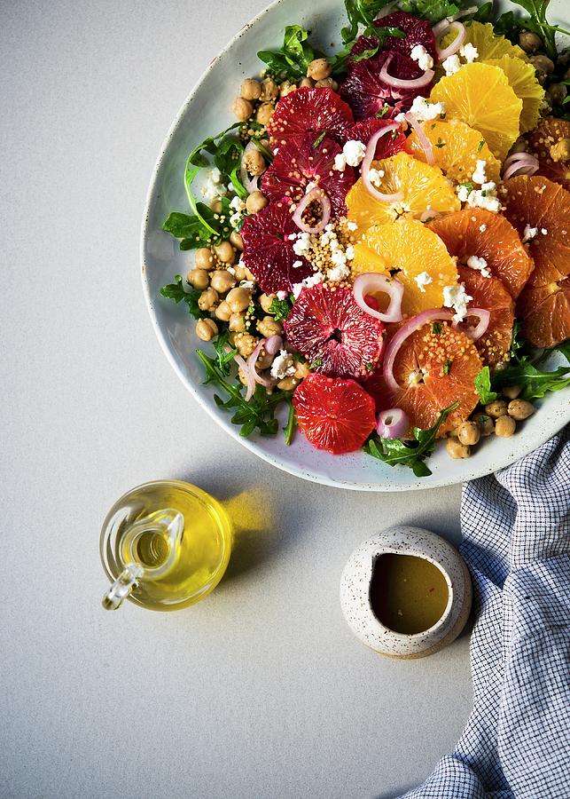 Chickpea And Rocket Salad With Three Types Of Orange Slices Photograph by Lisa Rees