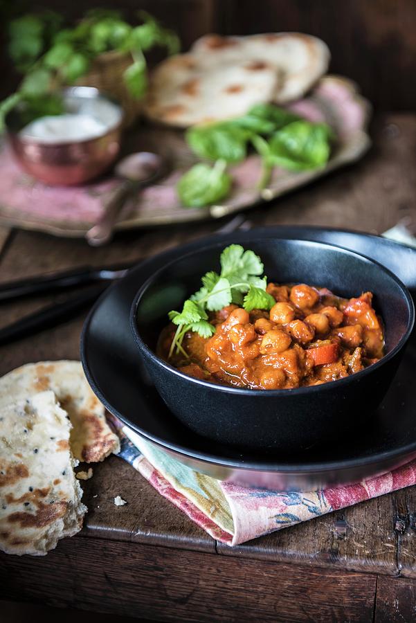 Chickpea And Spinach Curry With Fresh Coriander And Naan Bread india Photograph by Magdalena Hendey