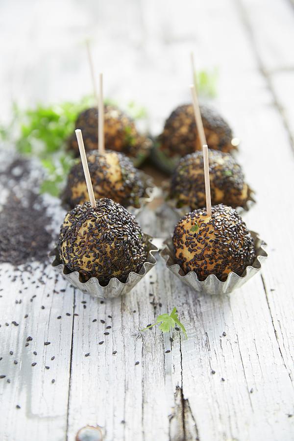 Chickpea Balls With Black Sesame On Wooden Skewers Photograph by Jo Kirchherr