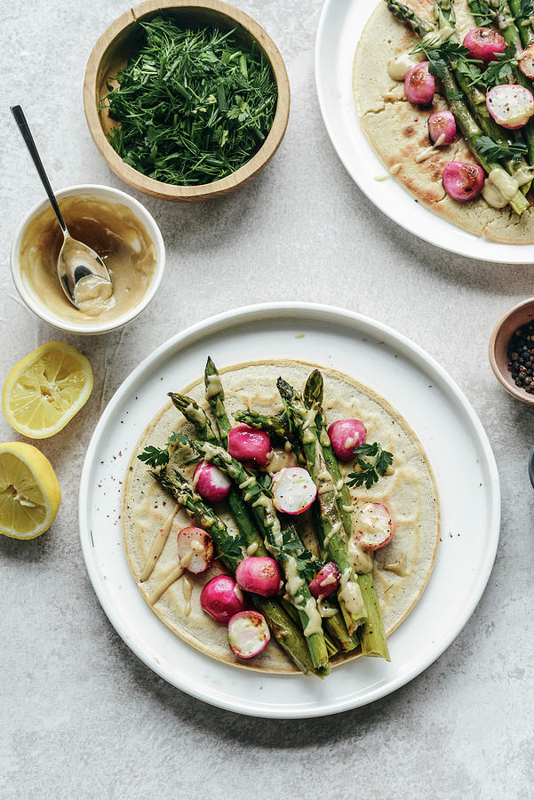 Chickpea Pancakes With Asparagus Roasted Radish Topped With Tahini Sauce Photograph by Kasia Wala