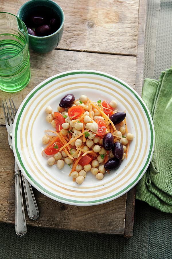 Chickpea Salad With Carrots, Tomatoes And Black Olives Photograph by Victoria Firmston