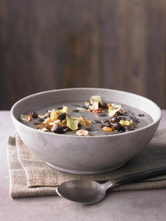 Chickpea Soup With Black Chickpeas, Fried White Cabbage And Roasted Hazelnuts Photograph by Jan-peter Westermann