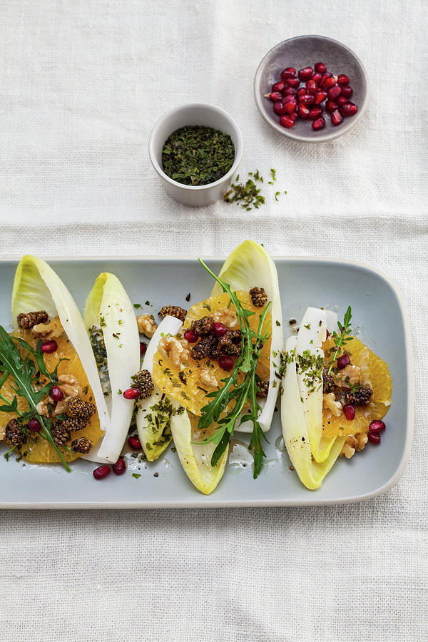 Chicory And Orange Salad With Pomegranate Seed And Ulva Flakes Photograph by Eising Studio